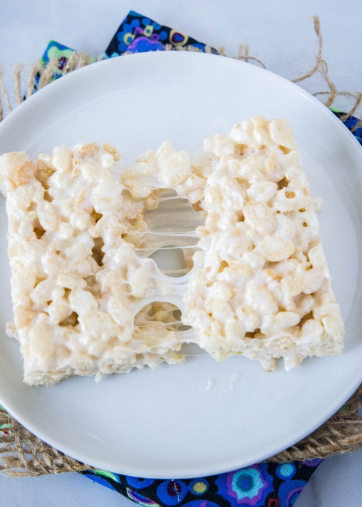 breaking a krispie treat in half