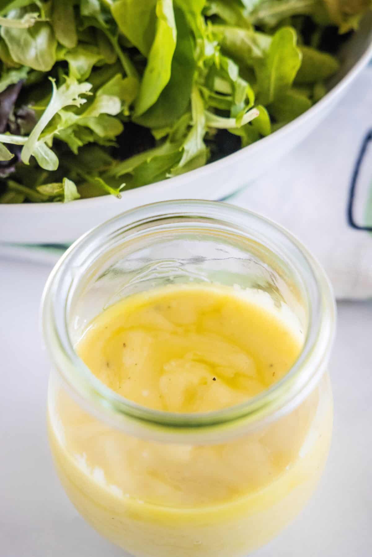 looking down on a jar with roasted garlic dressing