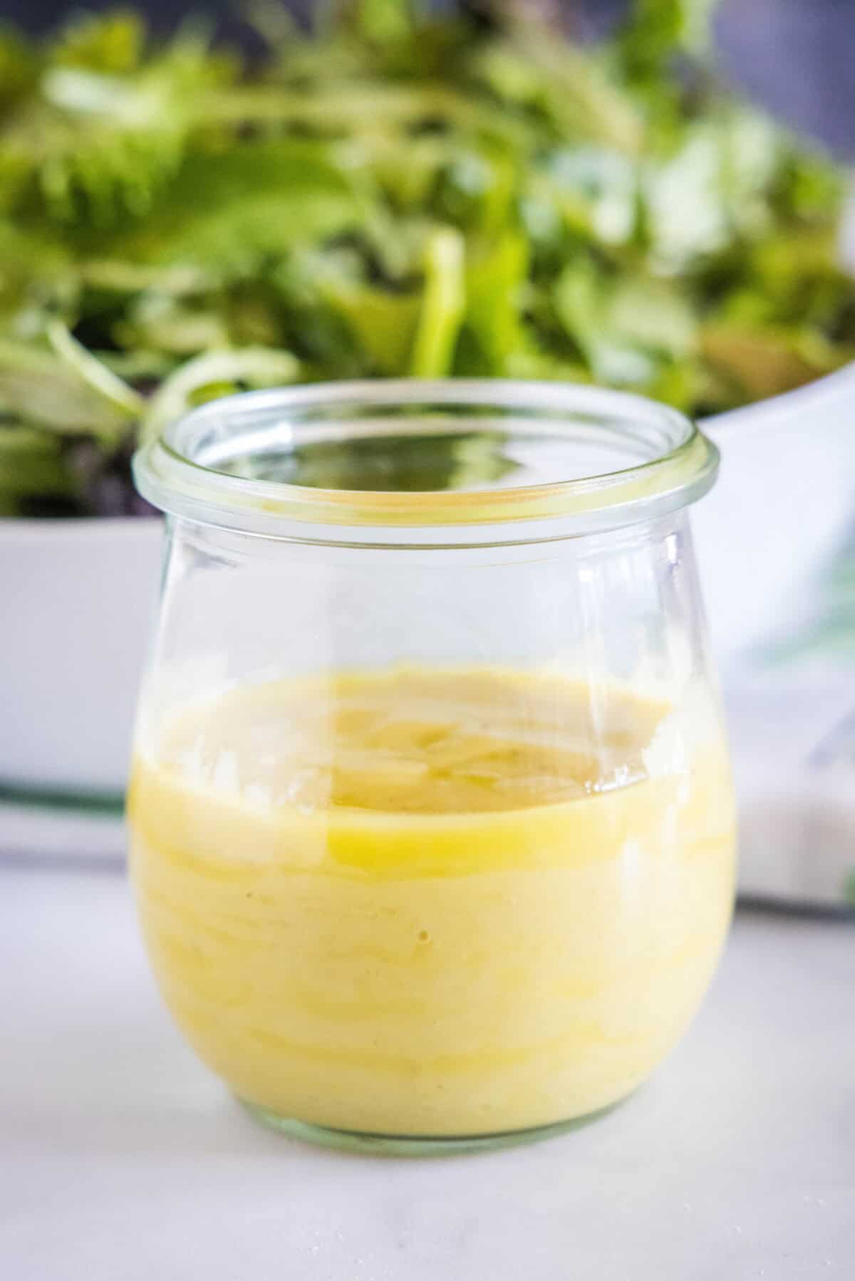 roasted garlic dressing in a small glass jar