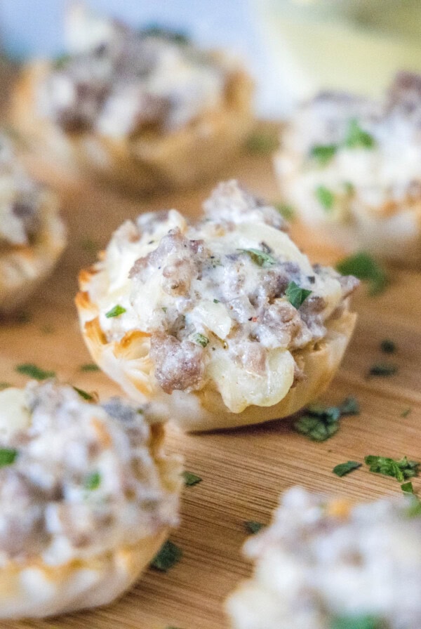 cropped close up sausage cup on cutting board