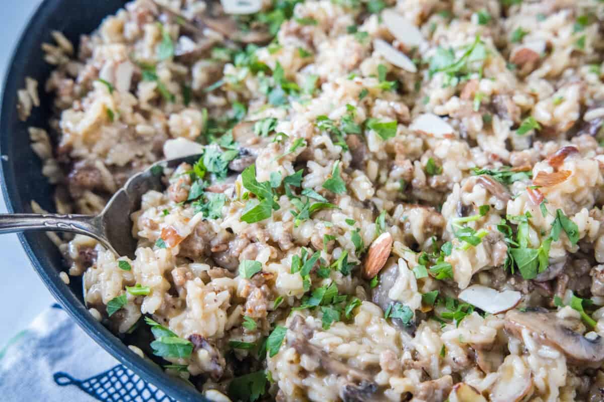 This sausage and rice casserole is super easy to make, loaded with flavor and can make it in the oven or if you are short on time, it is a great one pan meal.