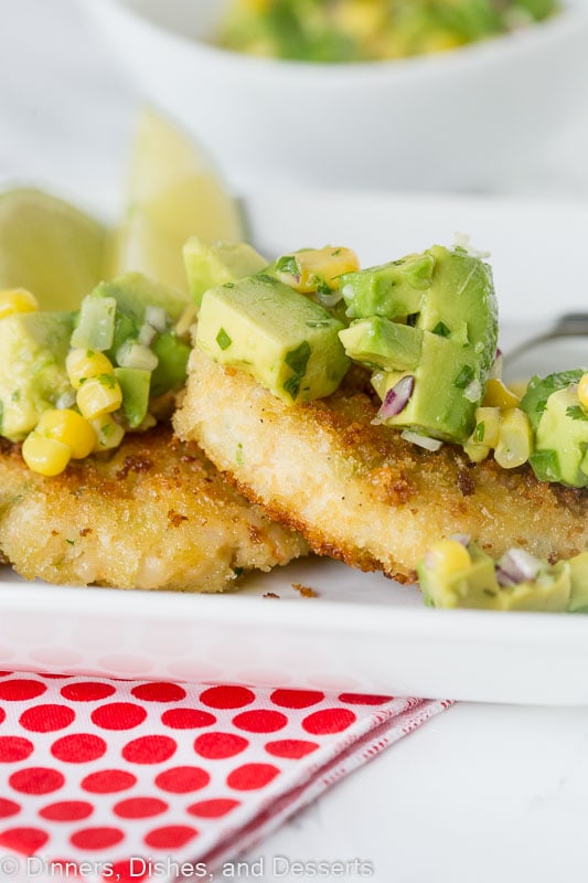 Shrimp cakes topped with avocado corn salsa