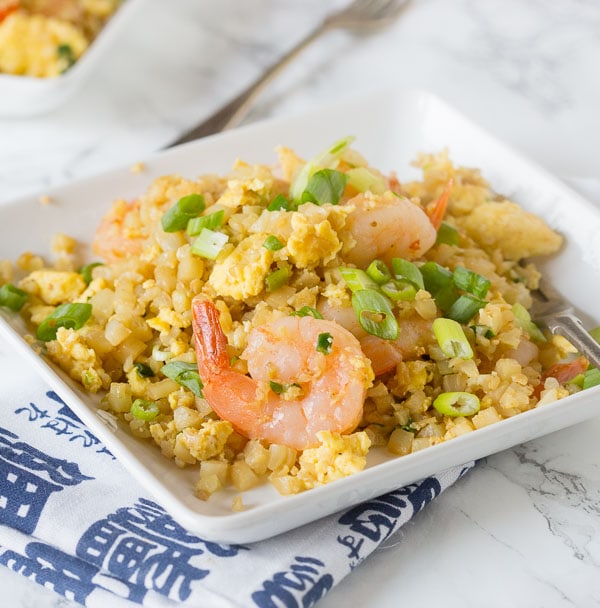 Cauliflower Shrimp Fried Rice – A healthy version of a Chinese take-out favorite! Ready in minutes and you don’t have to feel any guilt about fried rice again!