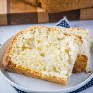 close up slice of bread with butter on a plate