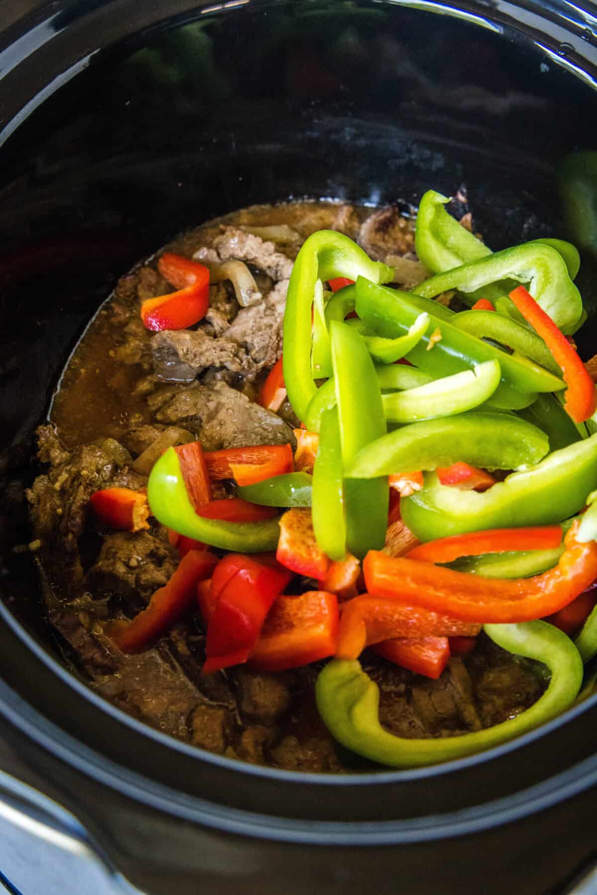 adding bell peppers to slow cooker pepper steak