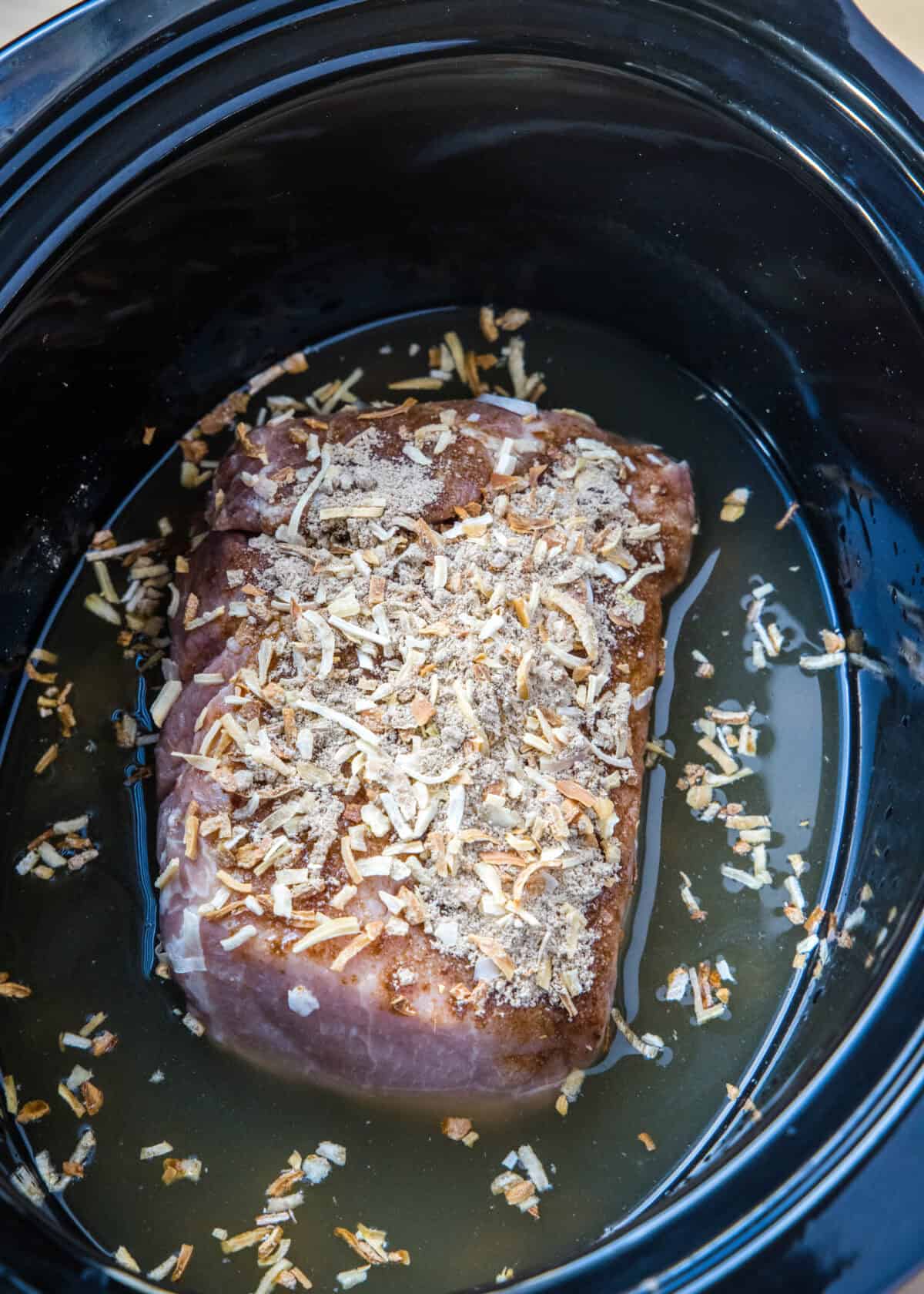 pork roast seasoned in slow cooker