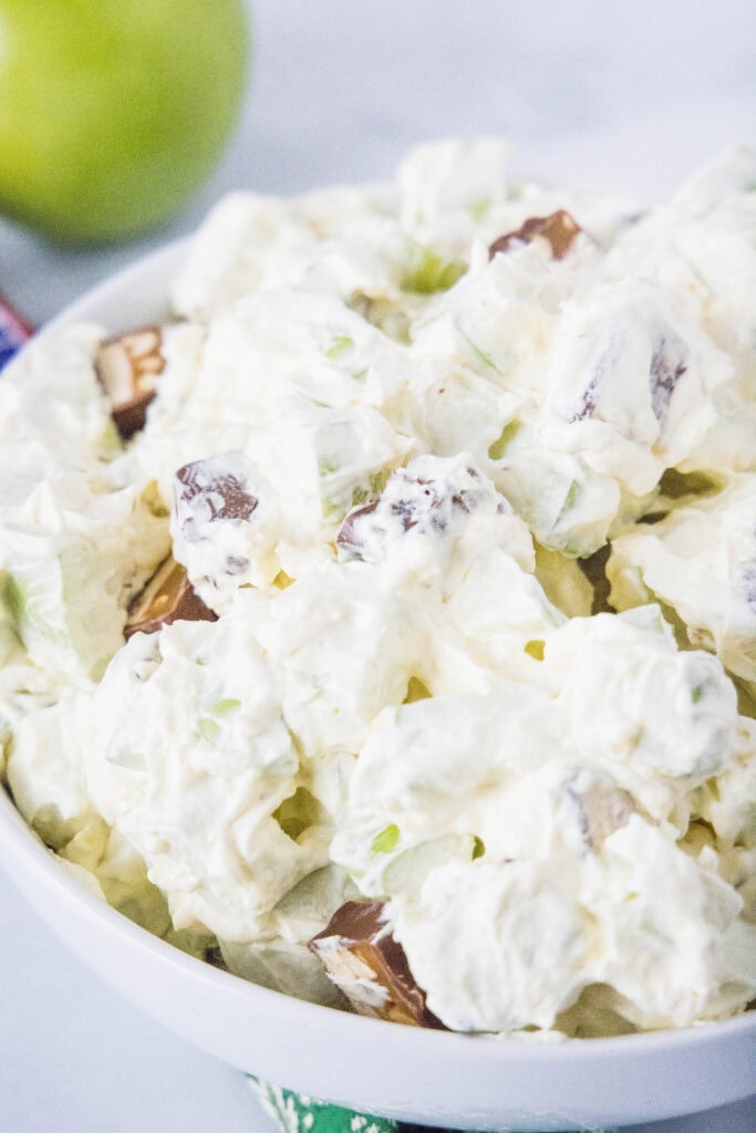 snicker apple salad in a serving bowl