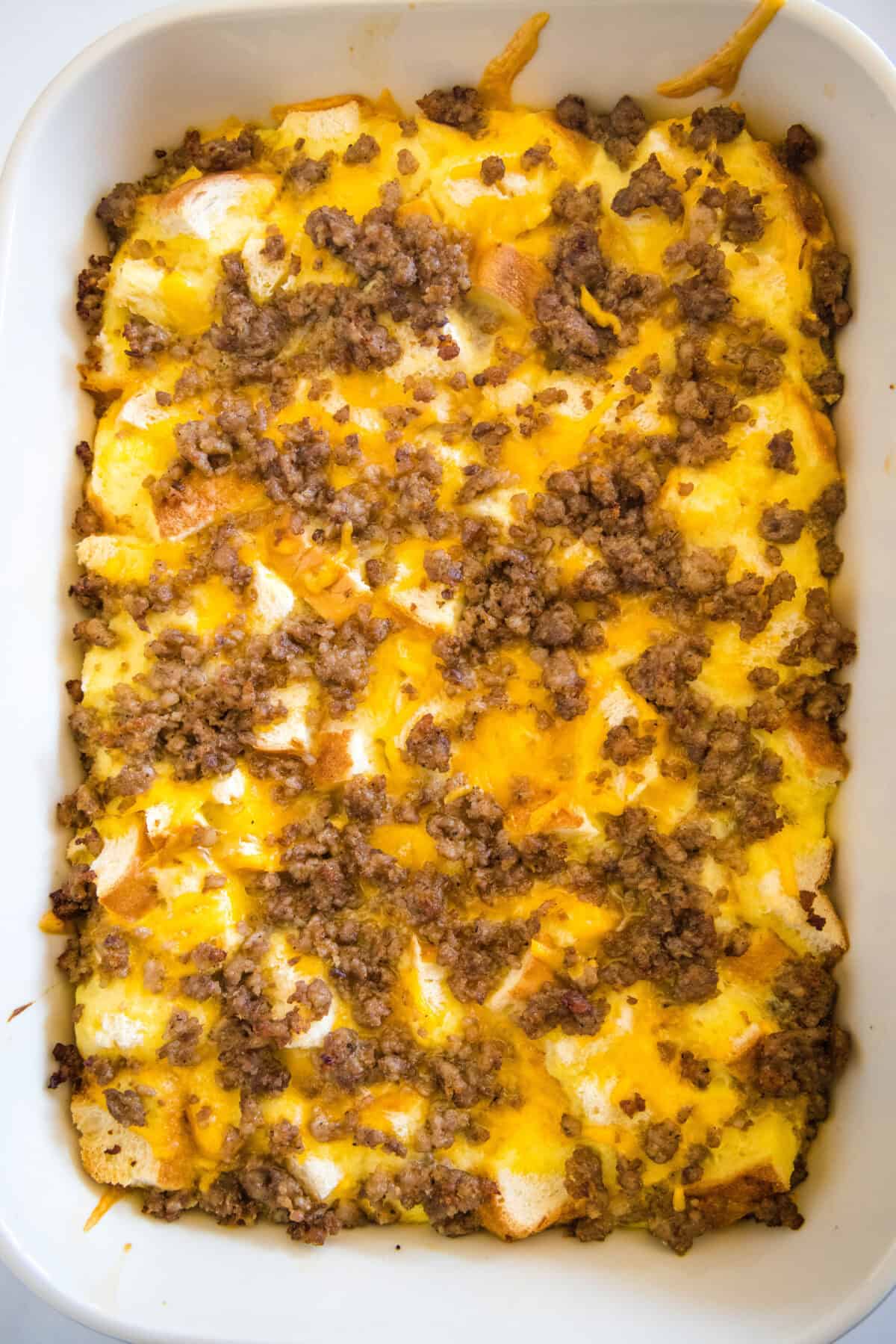 Overhead view of sourdough breakfast casserole in a baking dish.