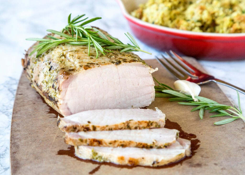 sliced pork loin on a cutting board