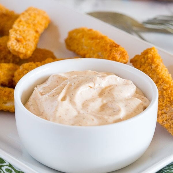 Spicy Cajun Dipping Sauce - this makes a great dip crunch fish sticks, topping for burgers, or even just a dip with chips. Perfectly creamy with a little kick!