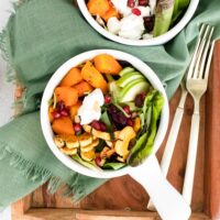 cropped in of squash salad in white bowl