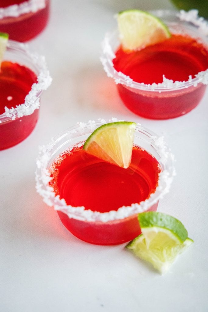 salted rim margarita jello shots on a table
