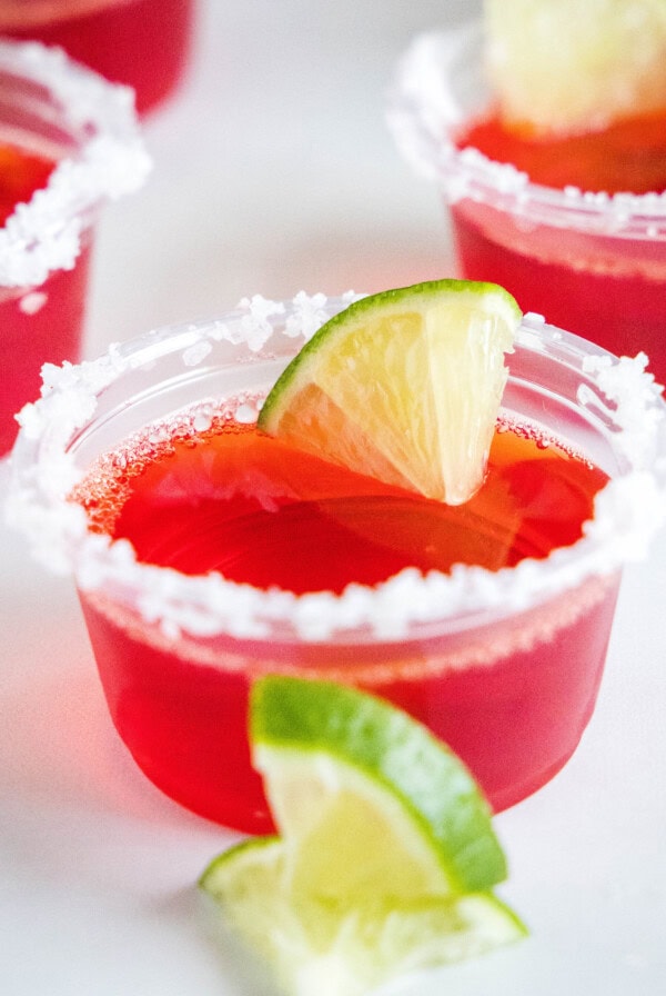 cropped close up strawberry margarita jello shots