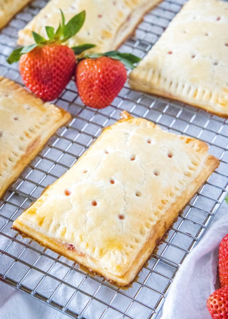 baked strawberry pop tart on cooling rack