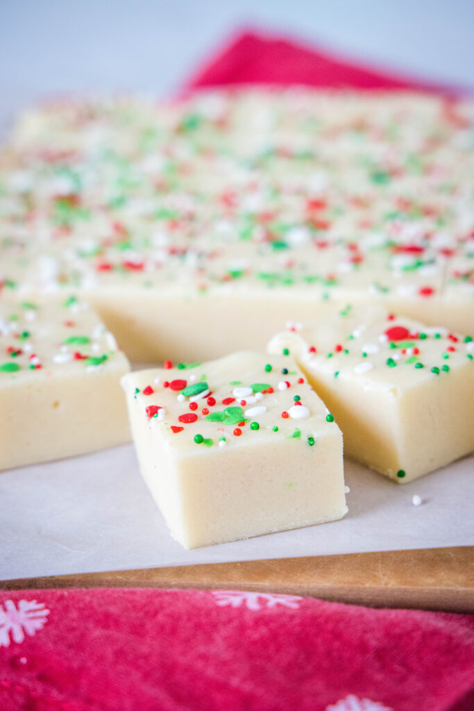 a slice of sugar cookie fudge with sprinkles