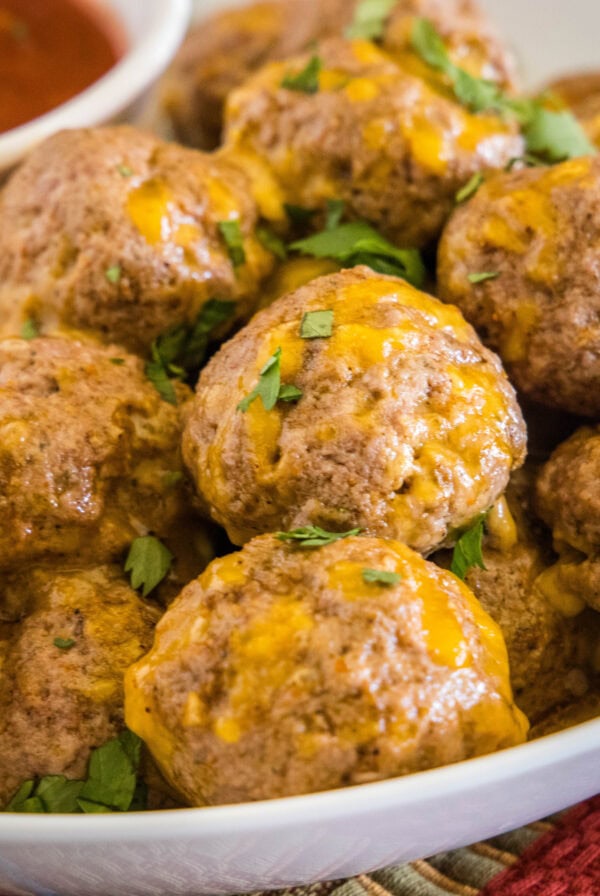close up taco meatballs in a plate with salsa