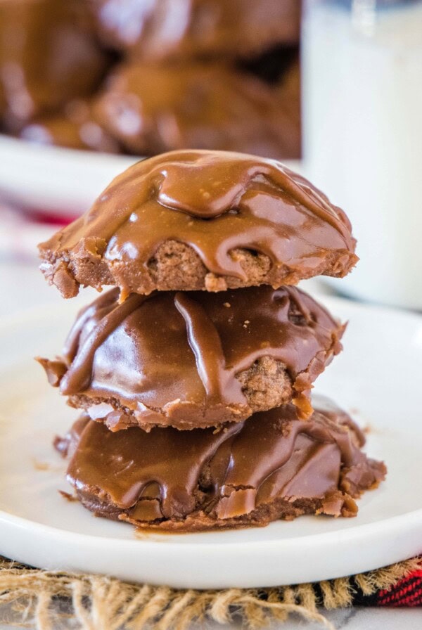 cropped in picture of sheet cake cookies stacked on a white plate