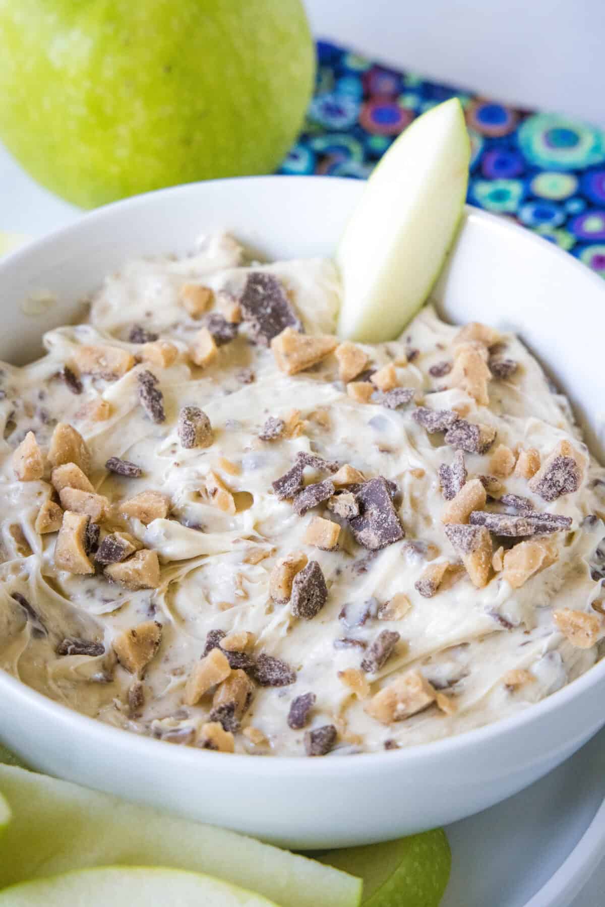 toffee apple dip in a bowl with apple slices