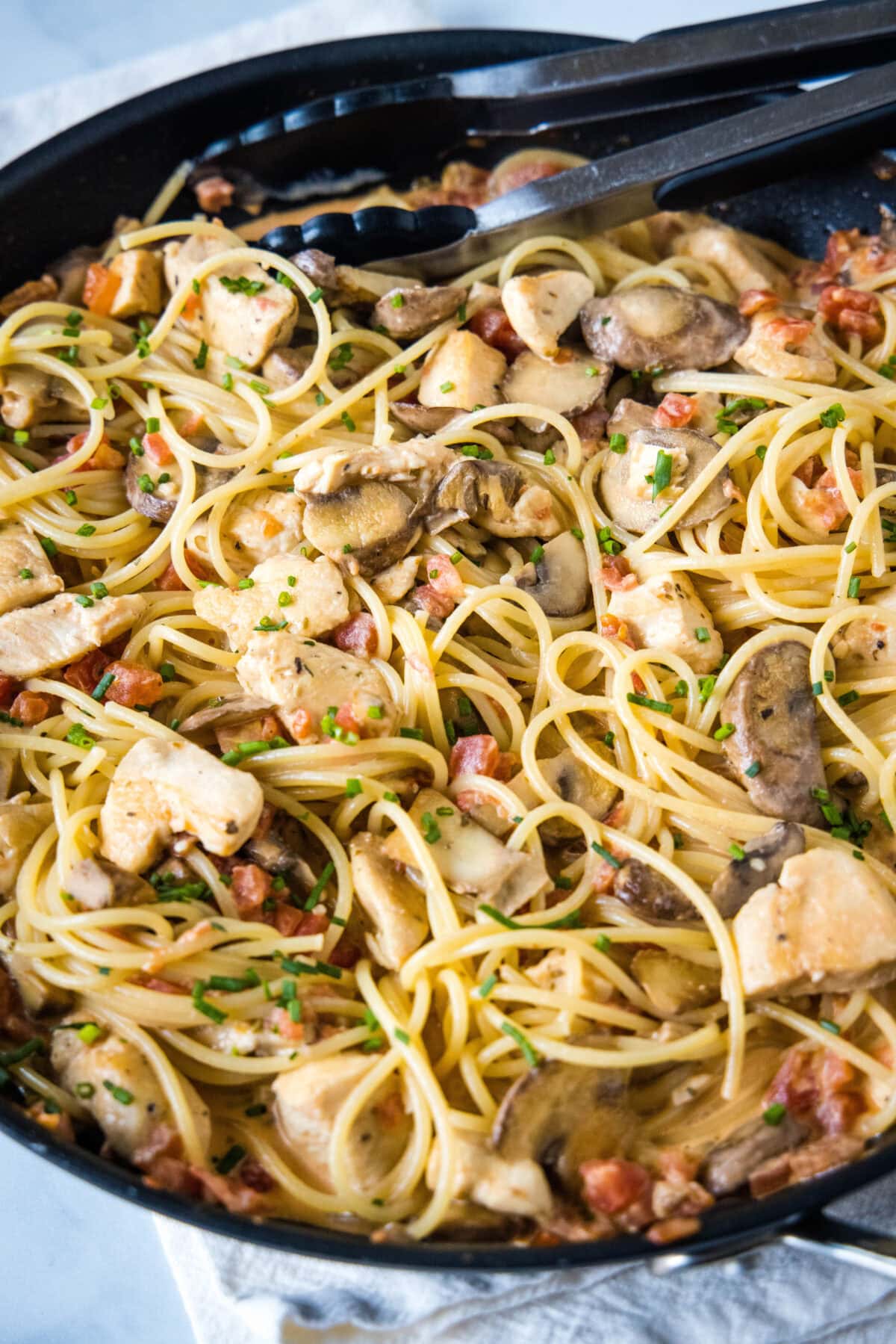 tuscan chicken pastsa in a skillet