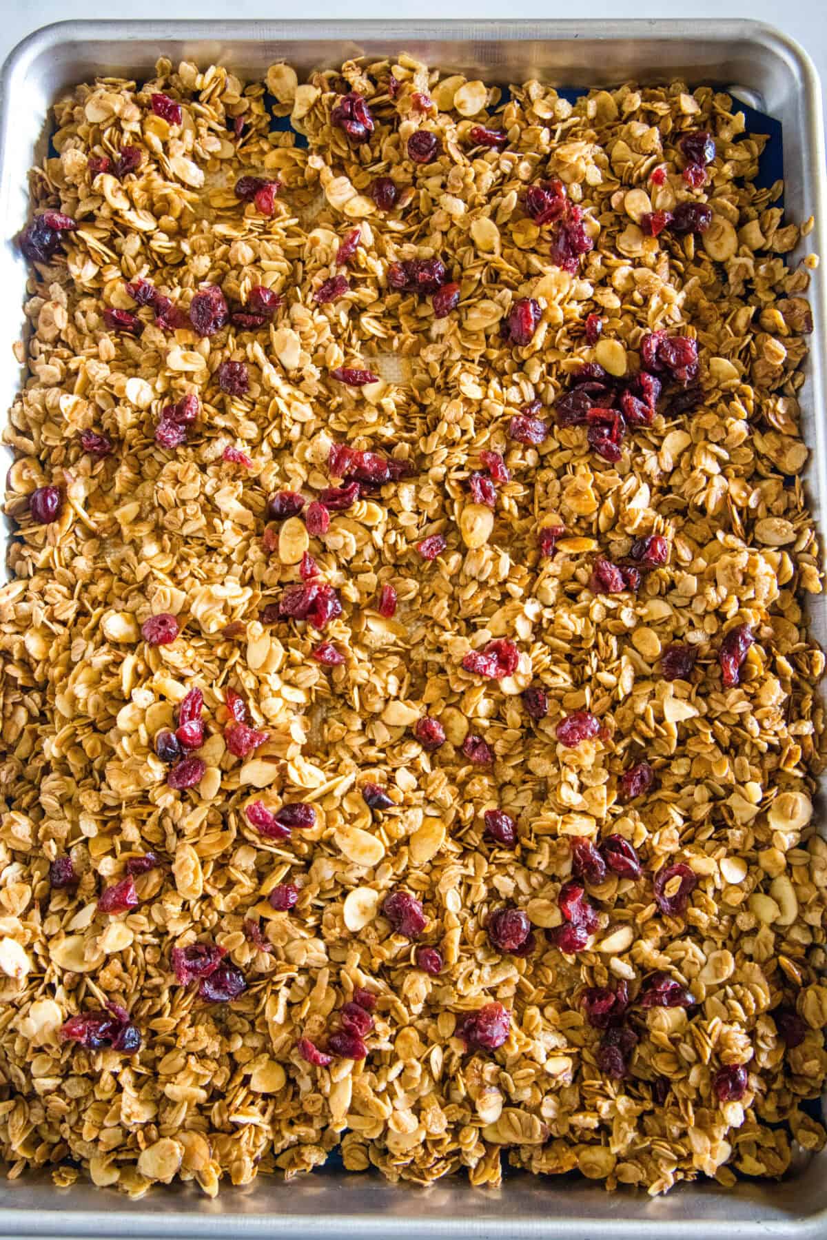 vanilla almond granola on a baking sheet