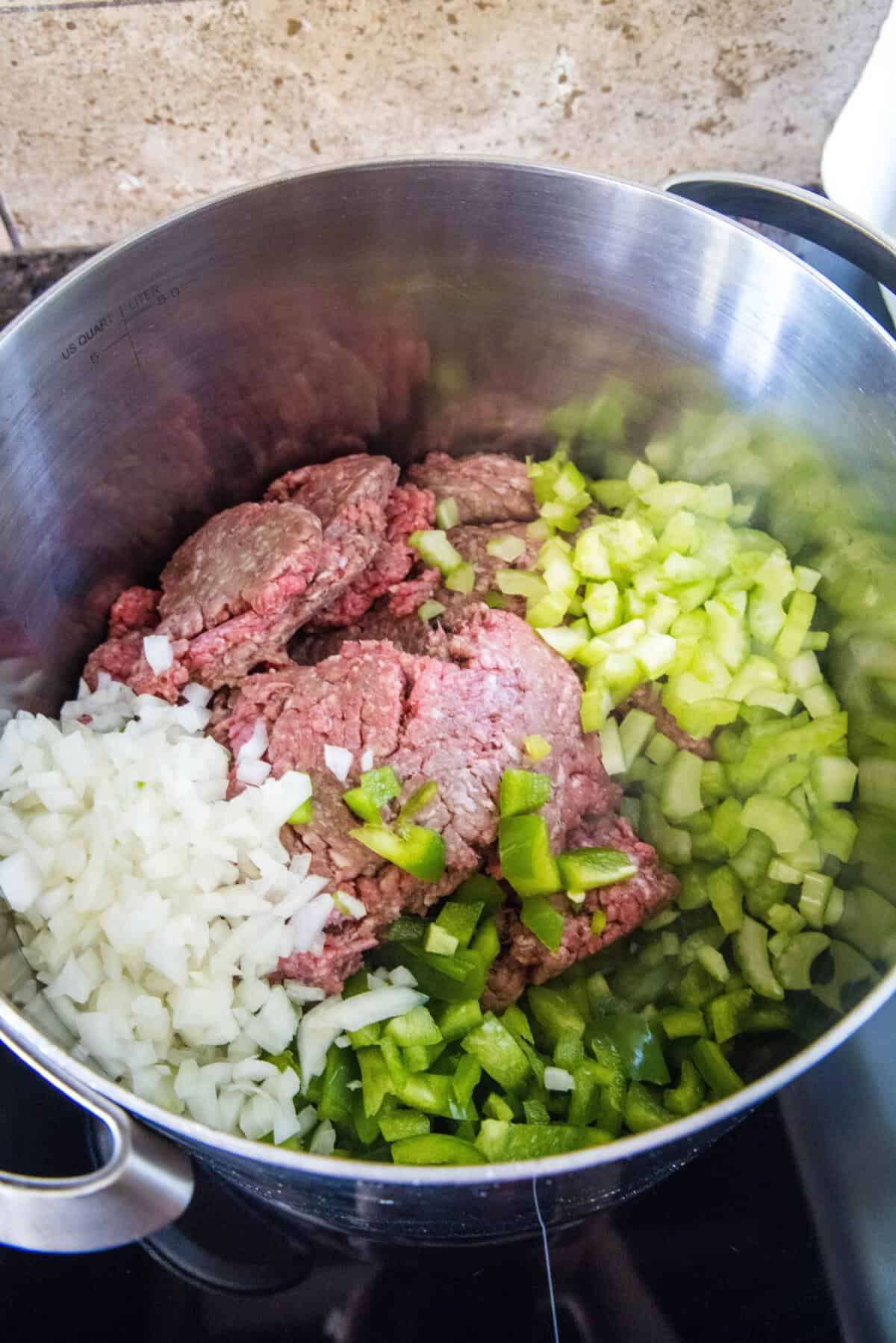 ground beef, onions, celery and bell pepper in a large pot