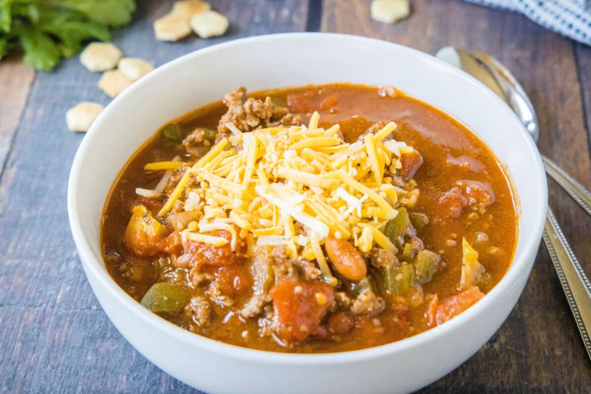 a bowl of wendy's chili topped with cheese