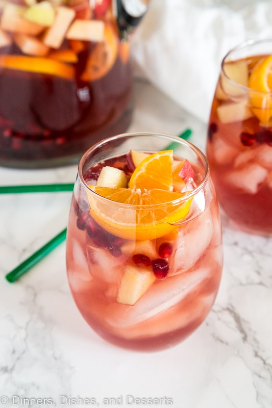 A close up of a glass with Sangria and White wine